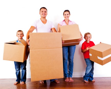 Boxes and household items organized in a Goddington storage space