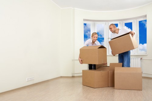 Worker handling a box safely in a storage unit area